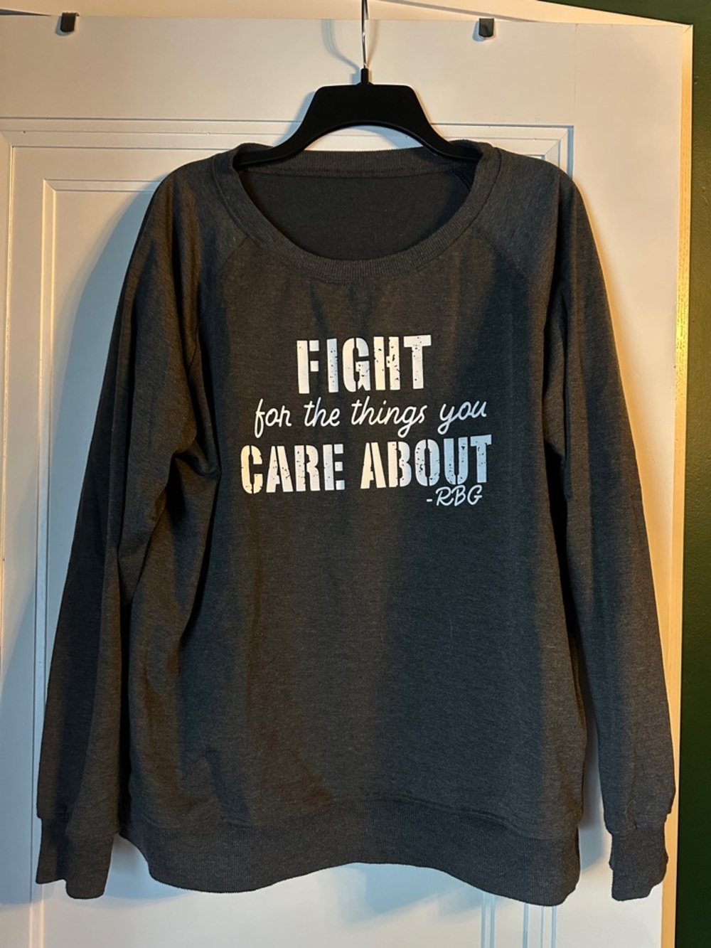 Dark Gray Sweatshirt with 'Fight for the Things You Care About' Print